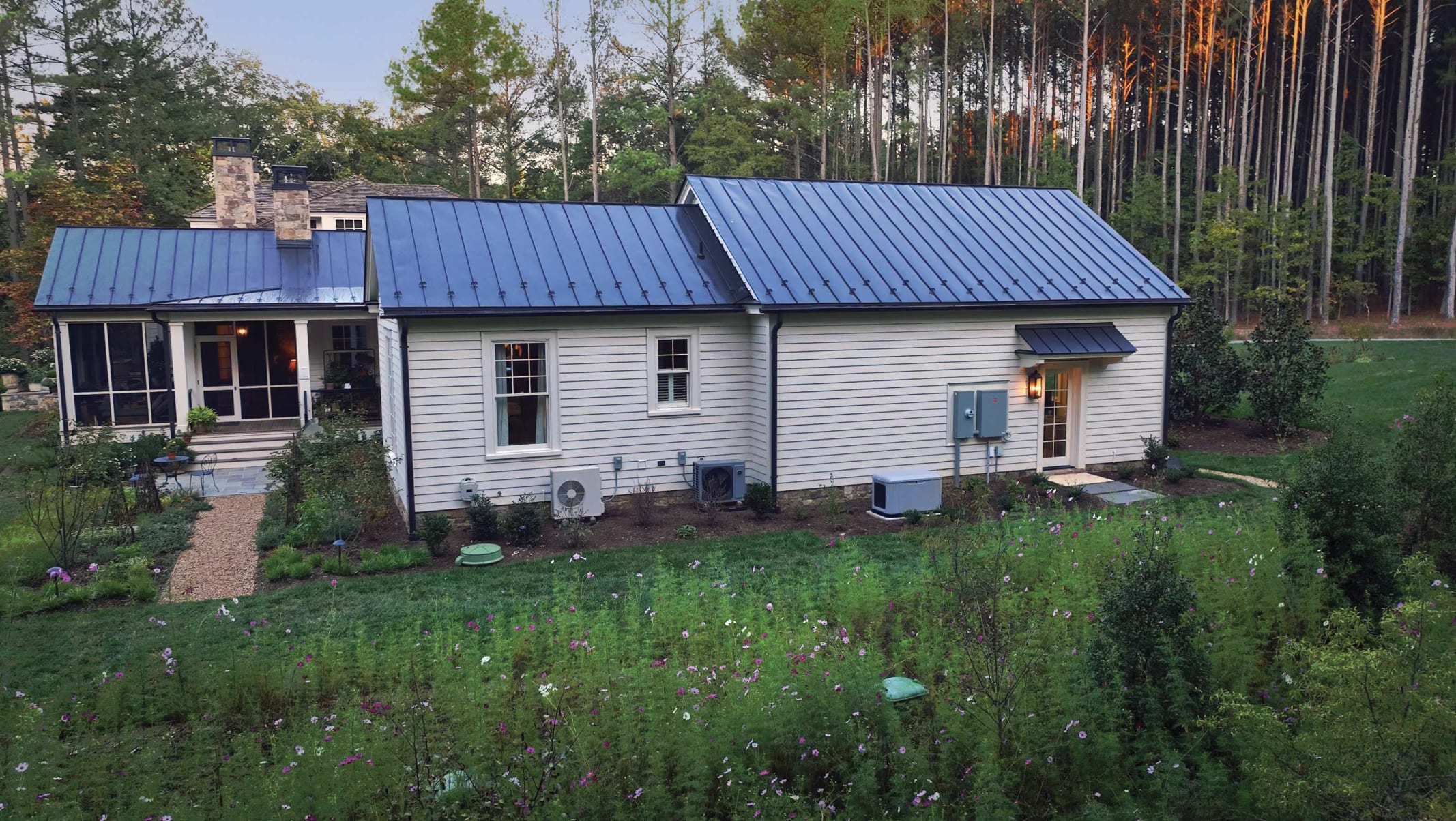 Exterior Side of House with Standby Generator, Tank Cover, Garage Light