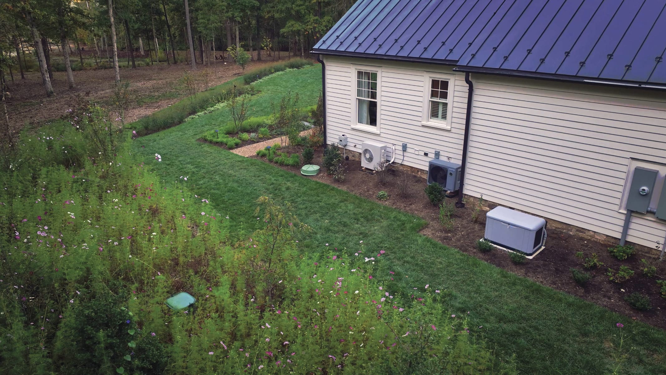 Exterior Side of House with Standby Generator & Tank Cover