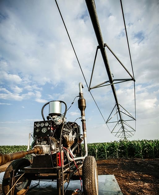 Irrigation Engine in Corn Field Photo | PERC